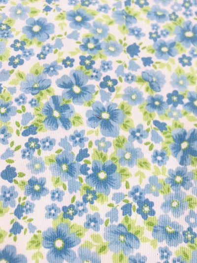 Pique flores azules/pistacho