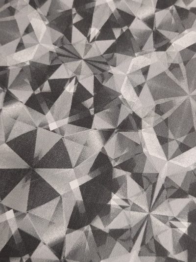 Mantelería Anti-Manchas Resinada caleidoscopio gris