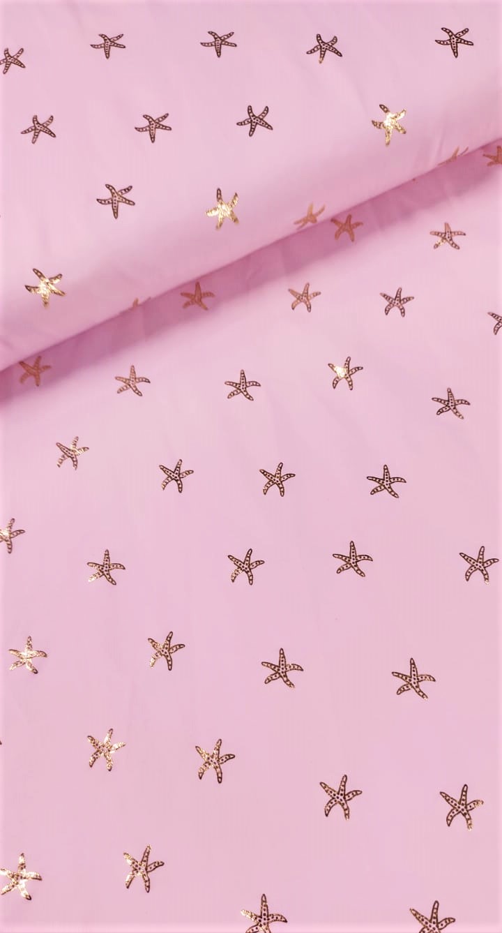 Lycra rosa estrellas de mar doradas