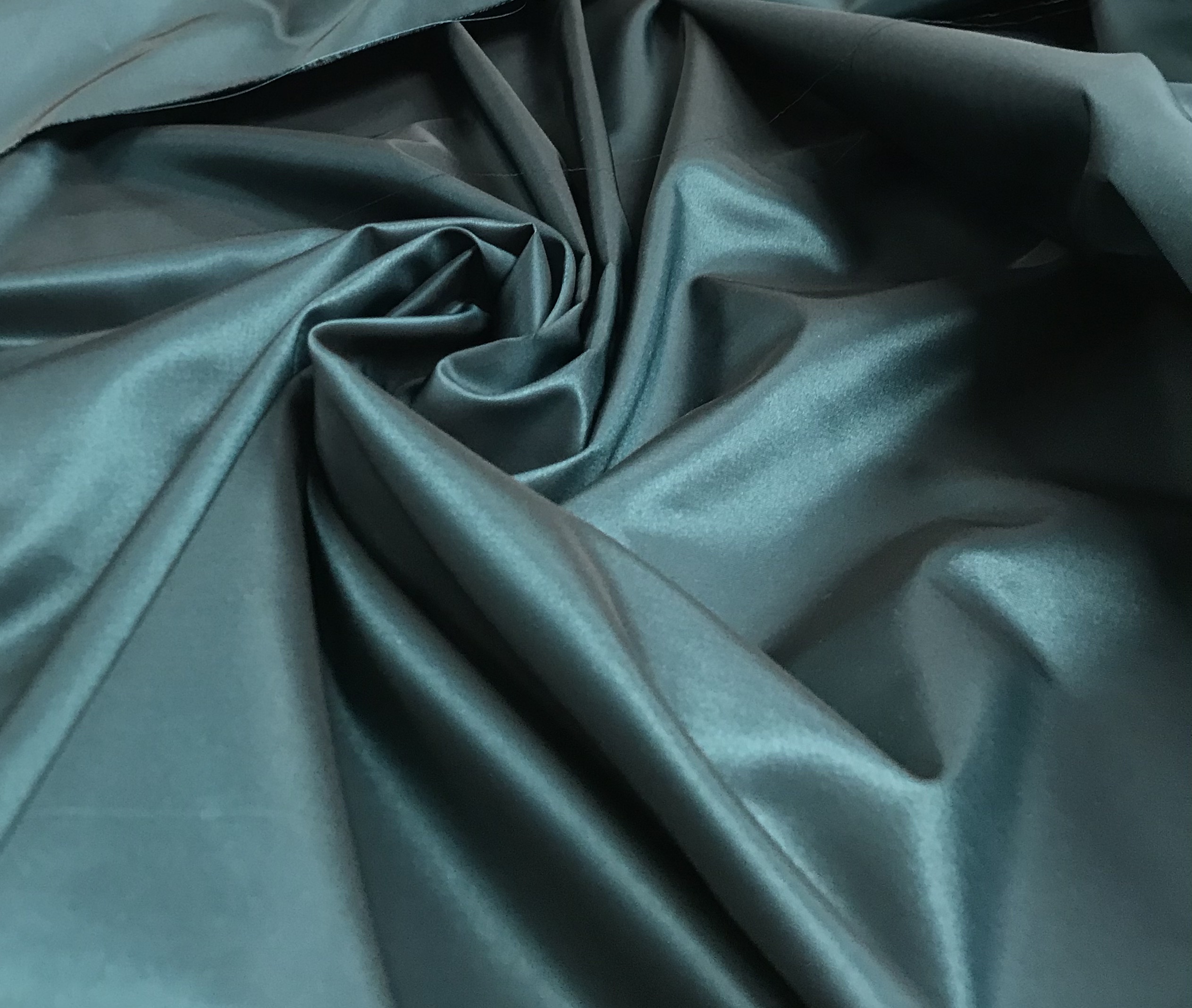 Tafetán verde petróleo