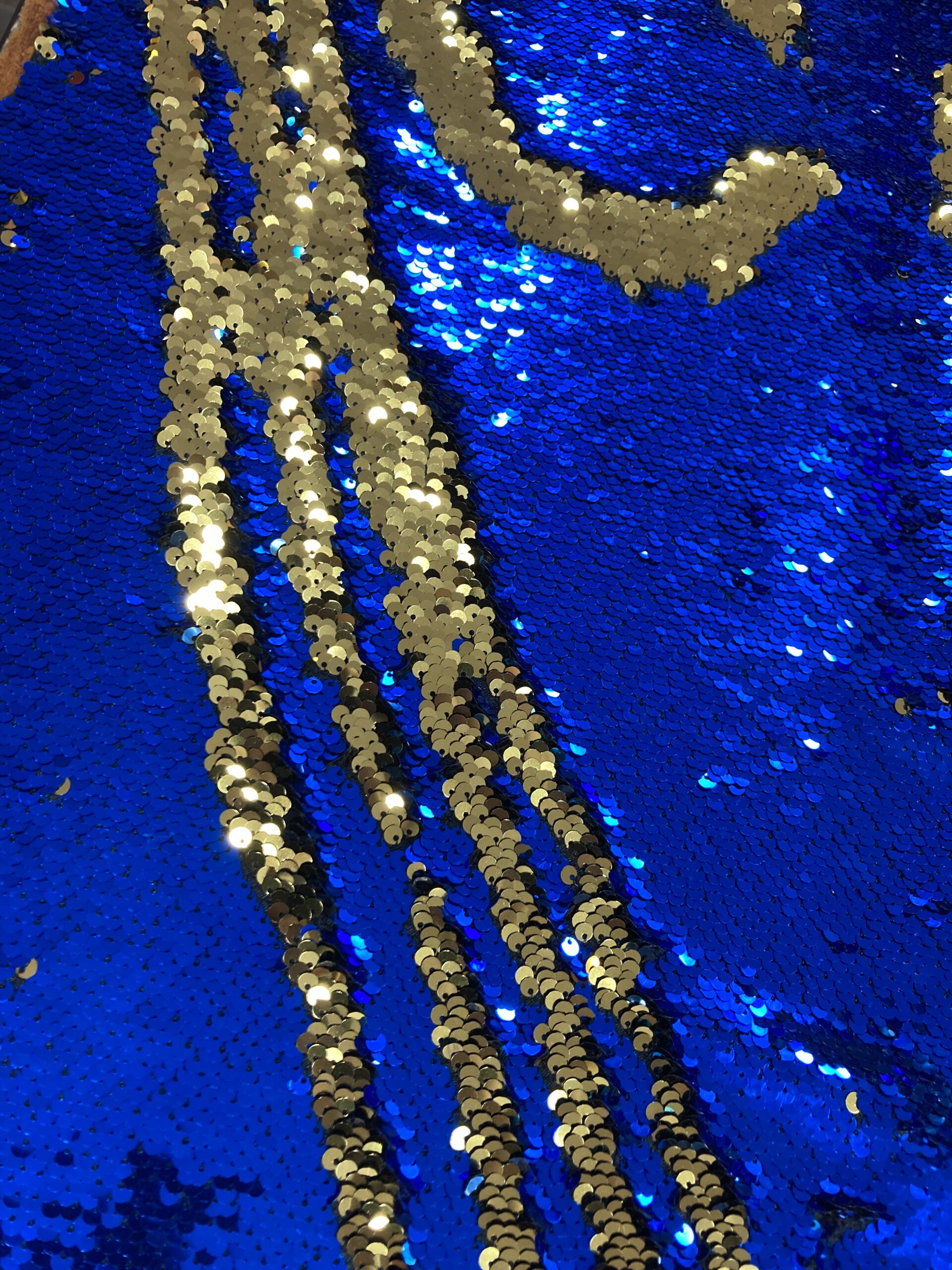 Lentejuela mágica o doble faz azulón/oro