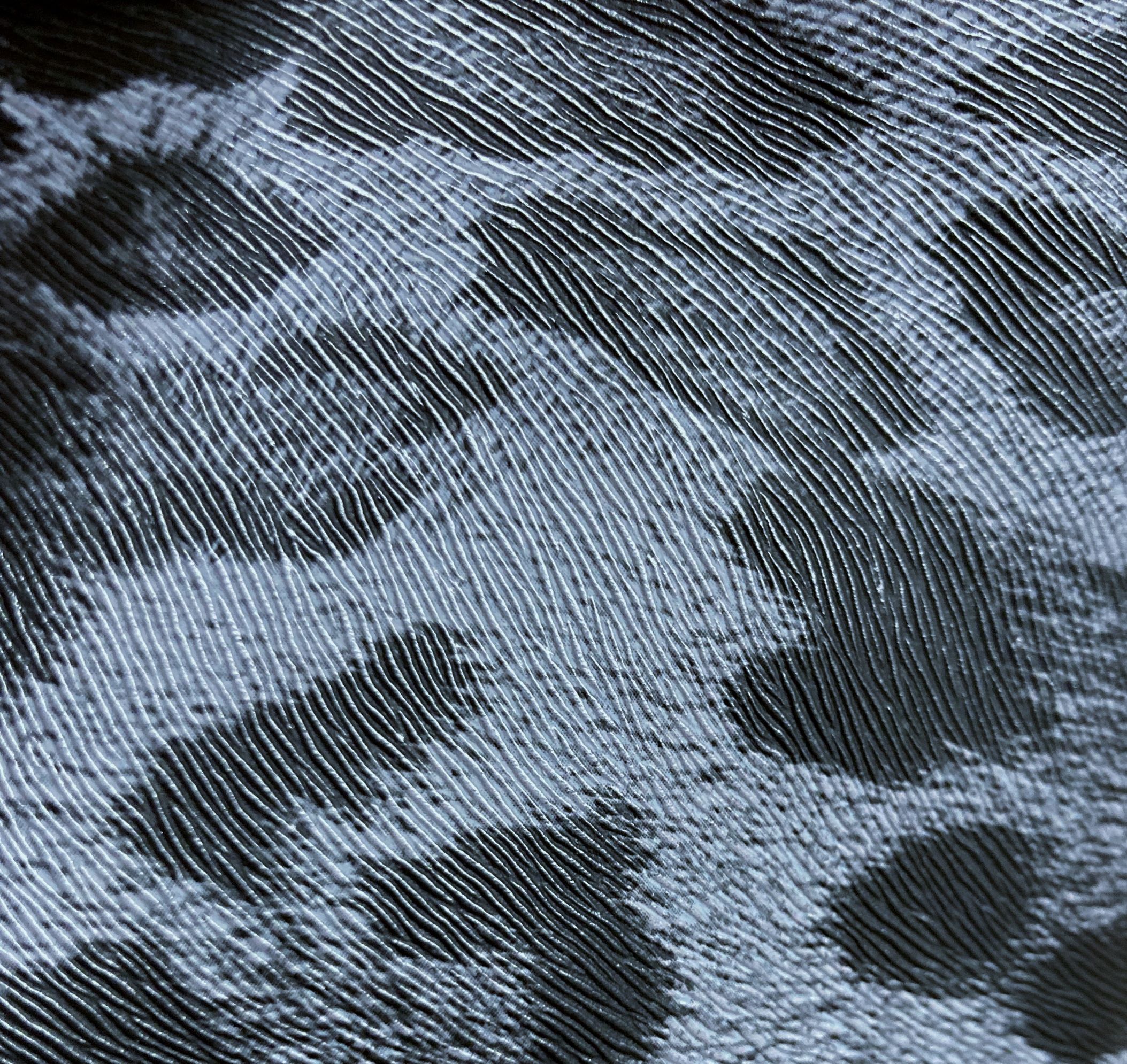 Polipiel animal print gris