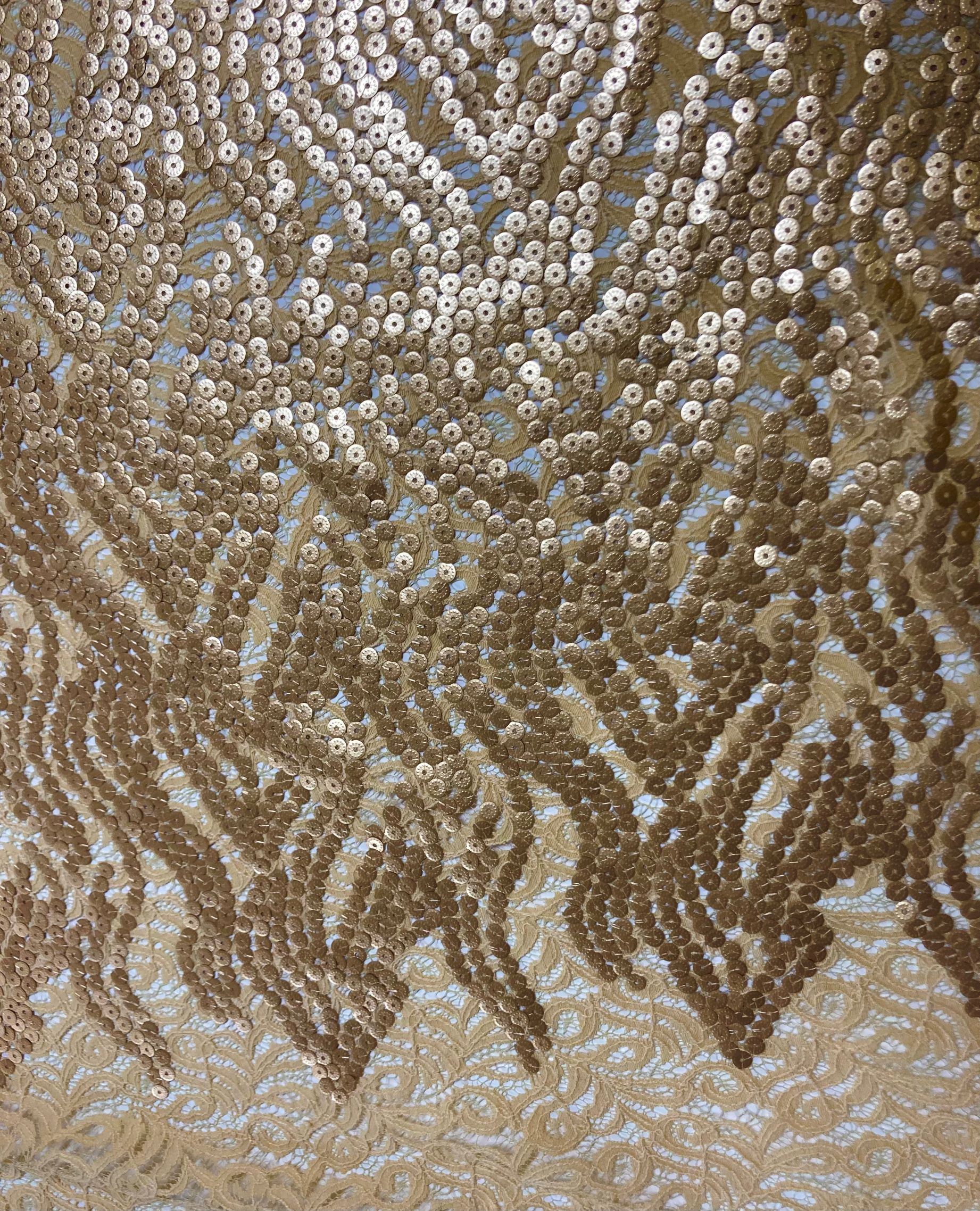 Encaje lentejuelas doradas