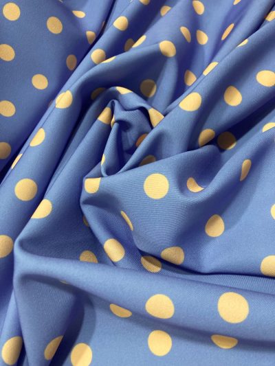 Bielástico gabardina lunar naranja pastel f.lila