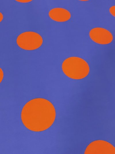 Bielástico gabardina lunar naranja f.morado