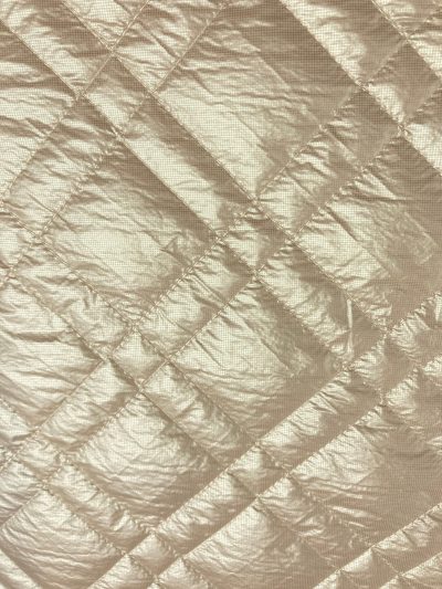 Acolchado metalizado beige