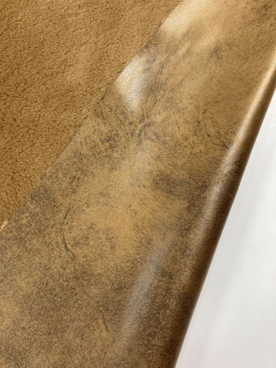 Pelo/piel gastada marrón